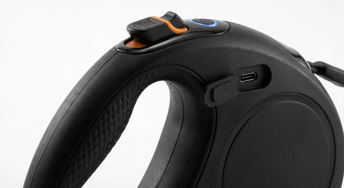 Close-up of light up retractable dog leash handle with USB charging and lock button